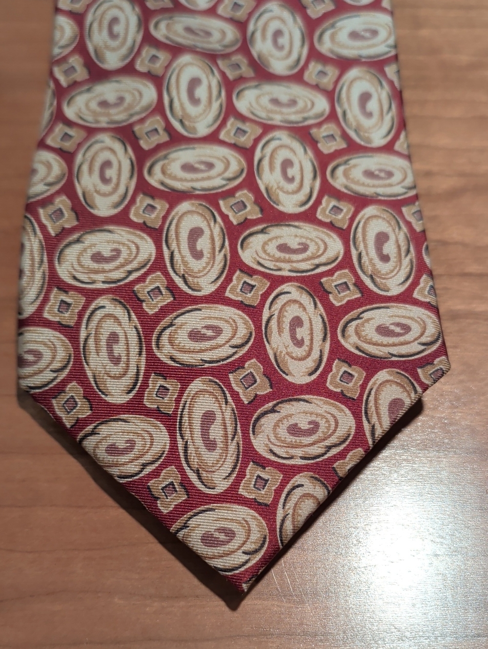 Saks Fifth Avenue Burgundy Silk Tie with Beige Oval Motif